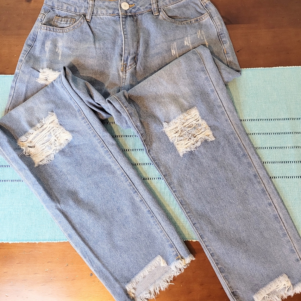 Women's jeans, distressed,ripped, light blue, size small